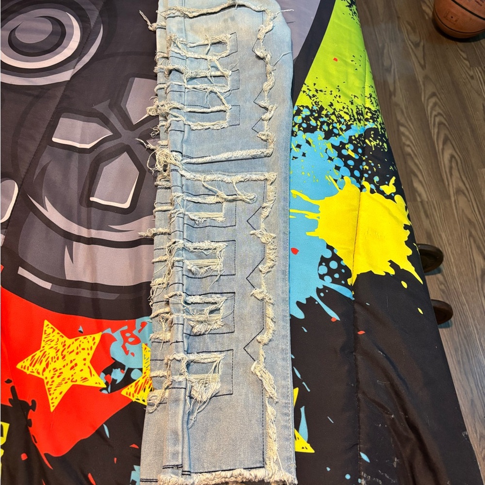 Distressed Light Blue Jeans - Picture 2 of 2